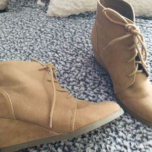 Tan booties in a women's 9